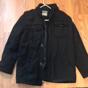 Full zip jacket with buttons.